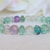 Green and purple fluorite rondelle bead bracelet