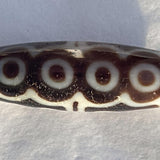 Authentic Tibetan dzi bead close view