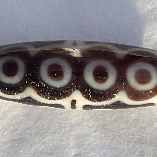 Authentic Tibetan dzi bead close view