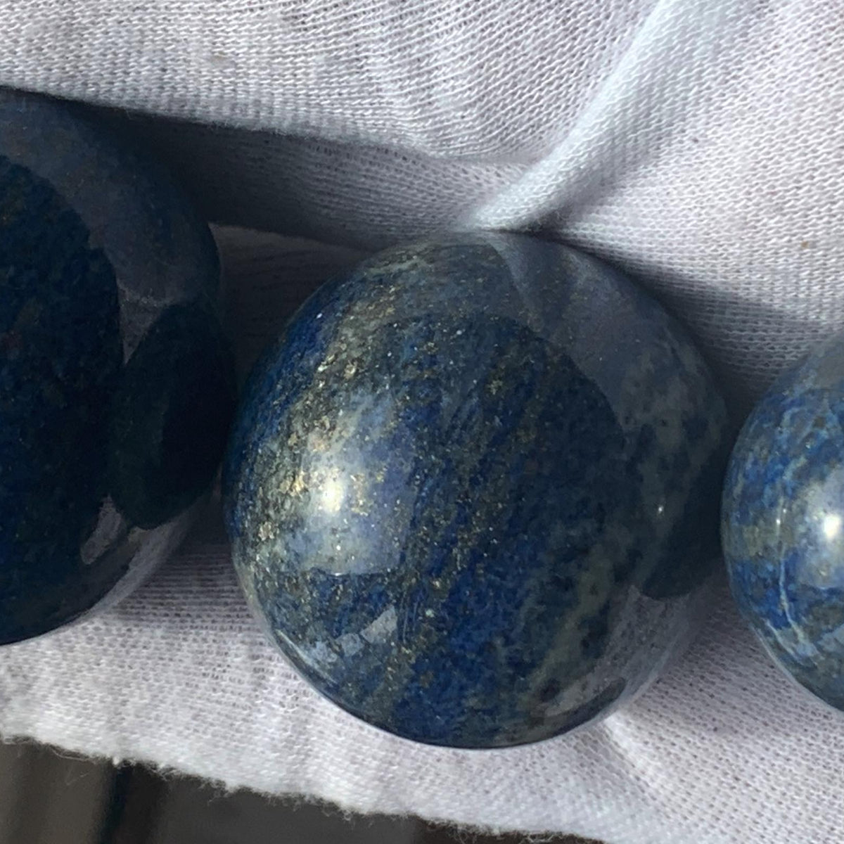 Polished lapis lazuli crystal sphere