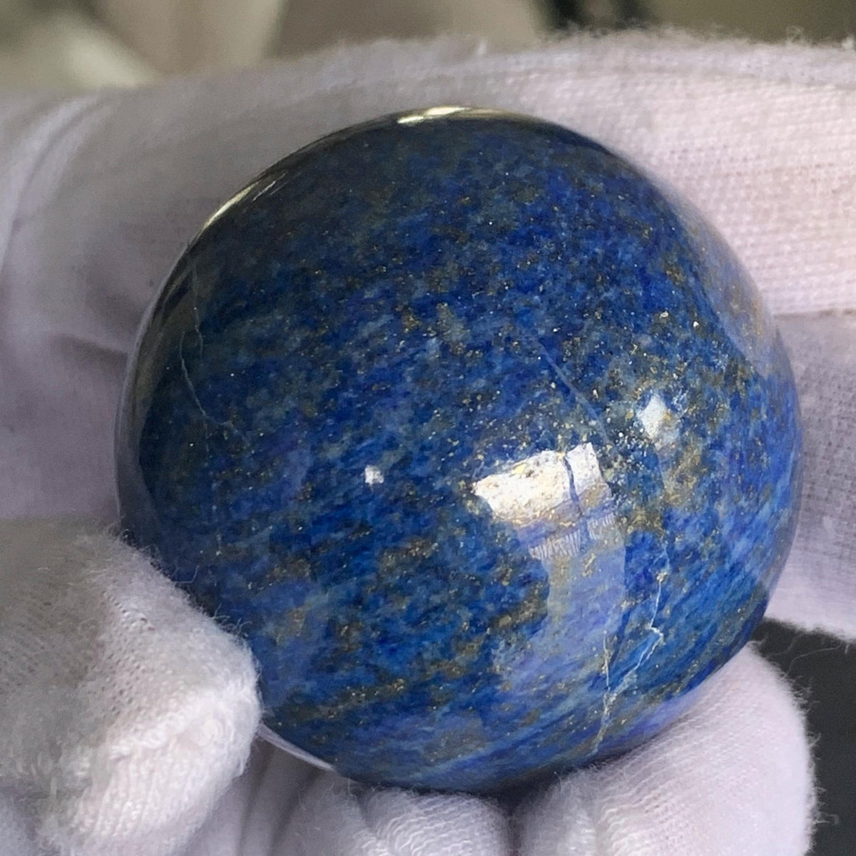 Polished lapis lazuli crystal sphere