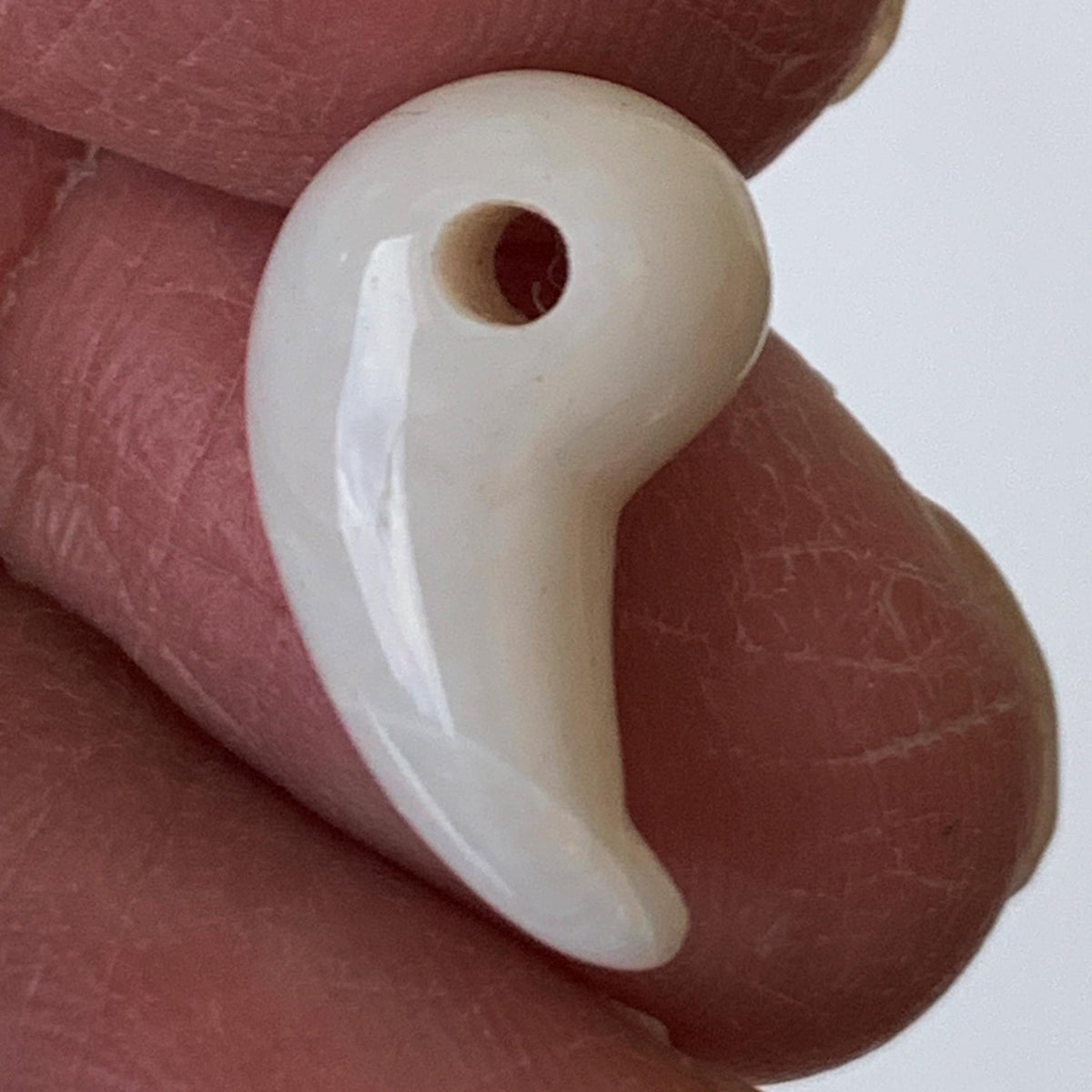Ancient style magatama carved from natural opal