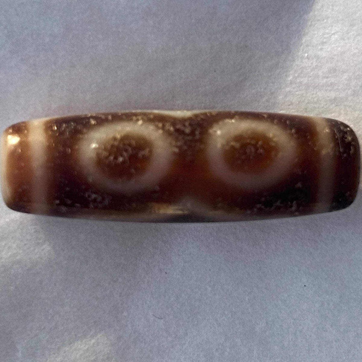 Authentic Tibetan dzi bead close view