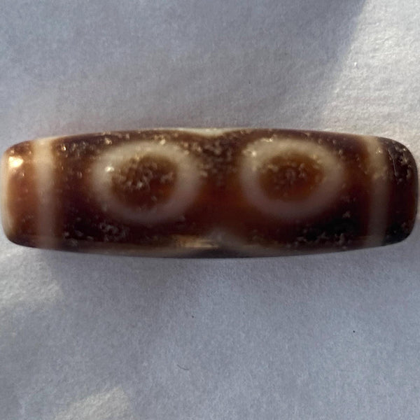 Authentic Tibetan dzi bead close view