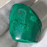 Healing crystal gift: a high-quality malachite pocket stone for heart chakra work.