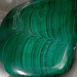 Polished malachite with concentric lines