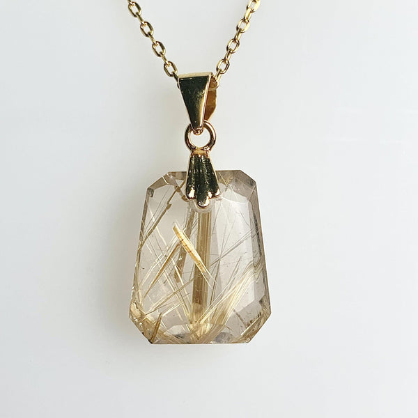 golden needle quartz pendant
