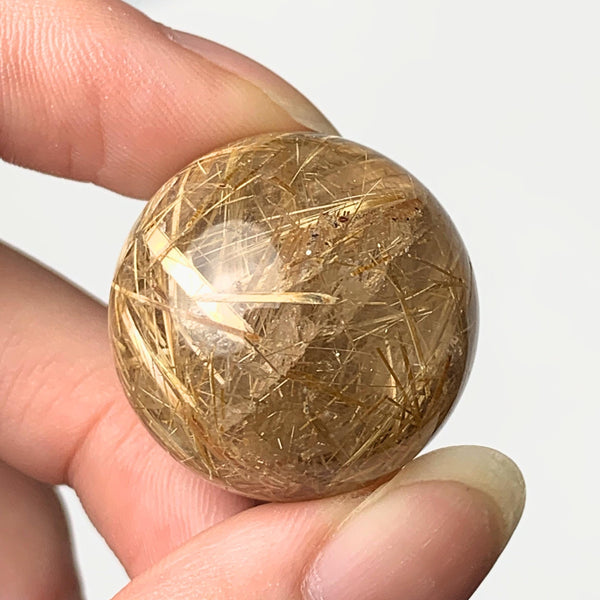 Golden rutile needle quartz specimen