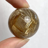 Golden rutile quartz polished crystal ball
