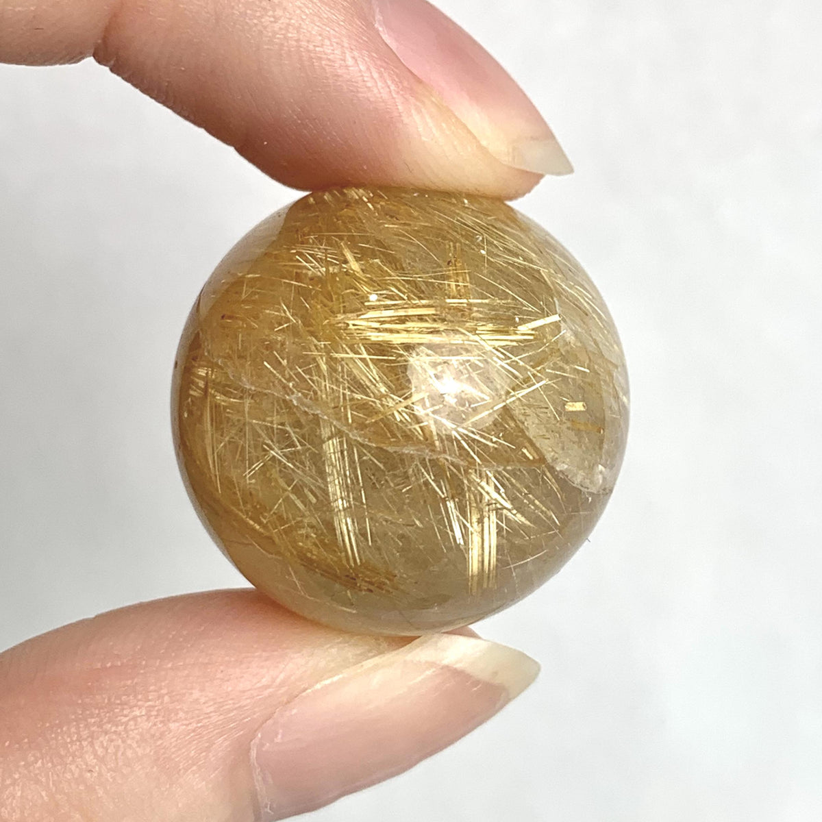 Natural rutile inclusion quartz sphere