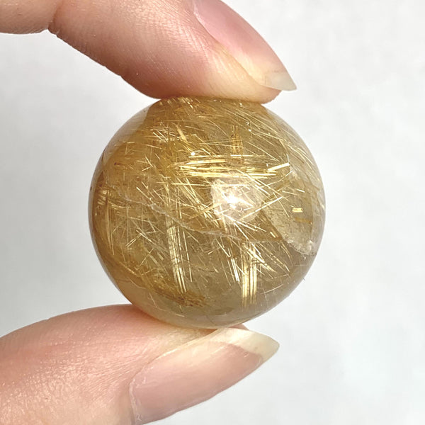 Natural rutile inclusion quartz sphere