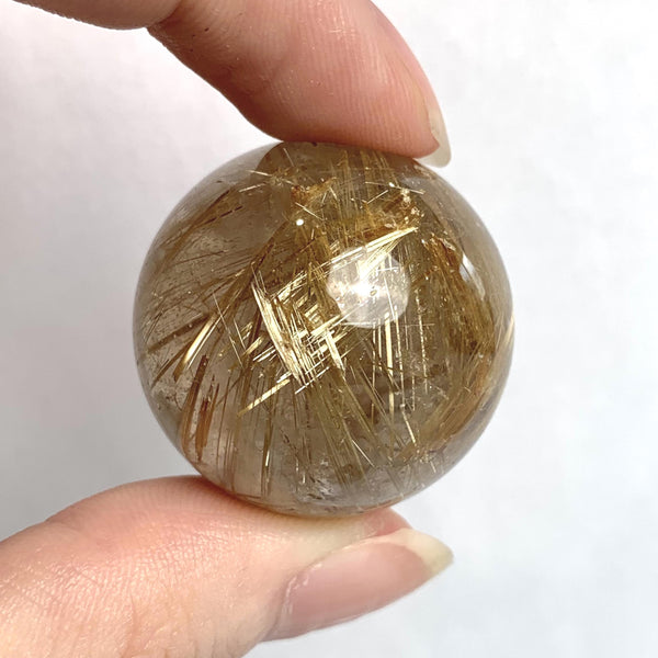 Healing crystal rutilated quartz ball