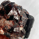 Large garnet with black tourmaline cabinet mineral piece