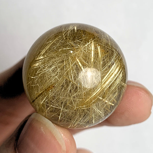 Natural rutile quartz crystal ball specimen