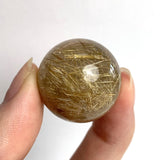 High grade rutilated quartz crystal sphere