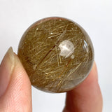 Natural rutilated quartz sphere display piece