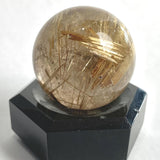 Golden rutile needle quartz sphere mineral specimen