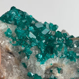 emerald green dioptase cluster on matrix specimen