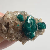 dioptase with large central crystal and two smaller