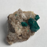 vivid green dioptase crystal group namibia