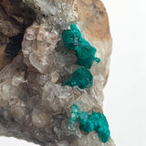 vivid green dioptase crystal formation rock
