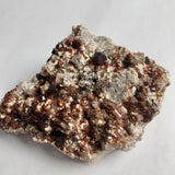 Deep red garnet mineral specimen collector display