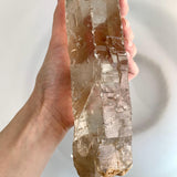 elongated smoky quartz crystal display