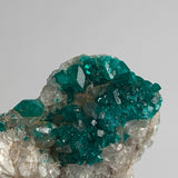 small cabinet dioptase specimen emerald green