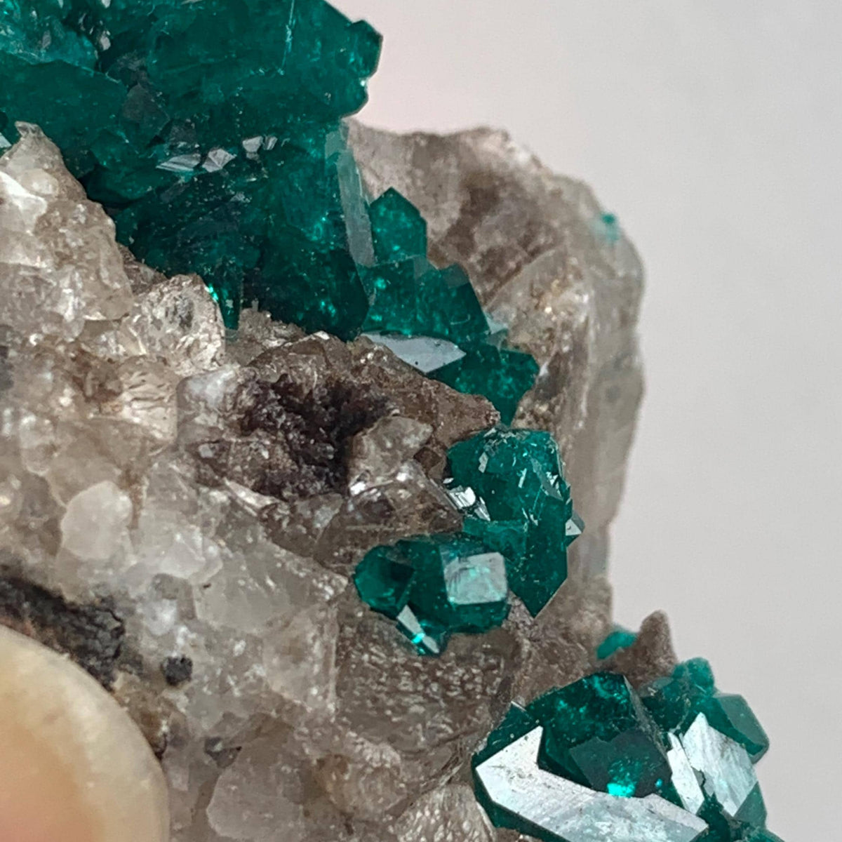 bright emerald green dioptase crystal formation