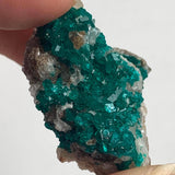 close up of natural copper mineral dioptase crystal
