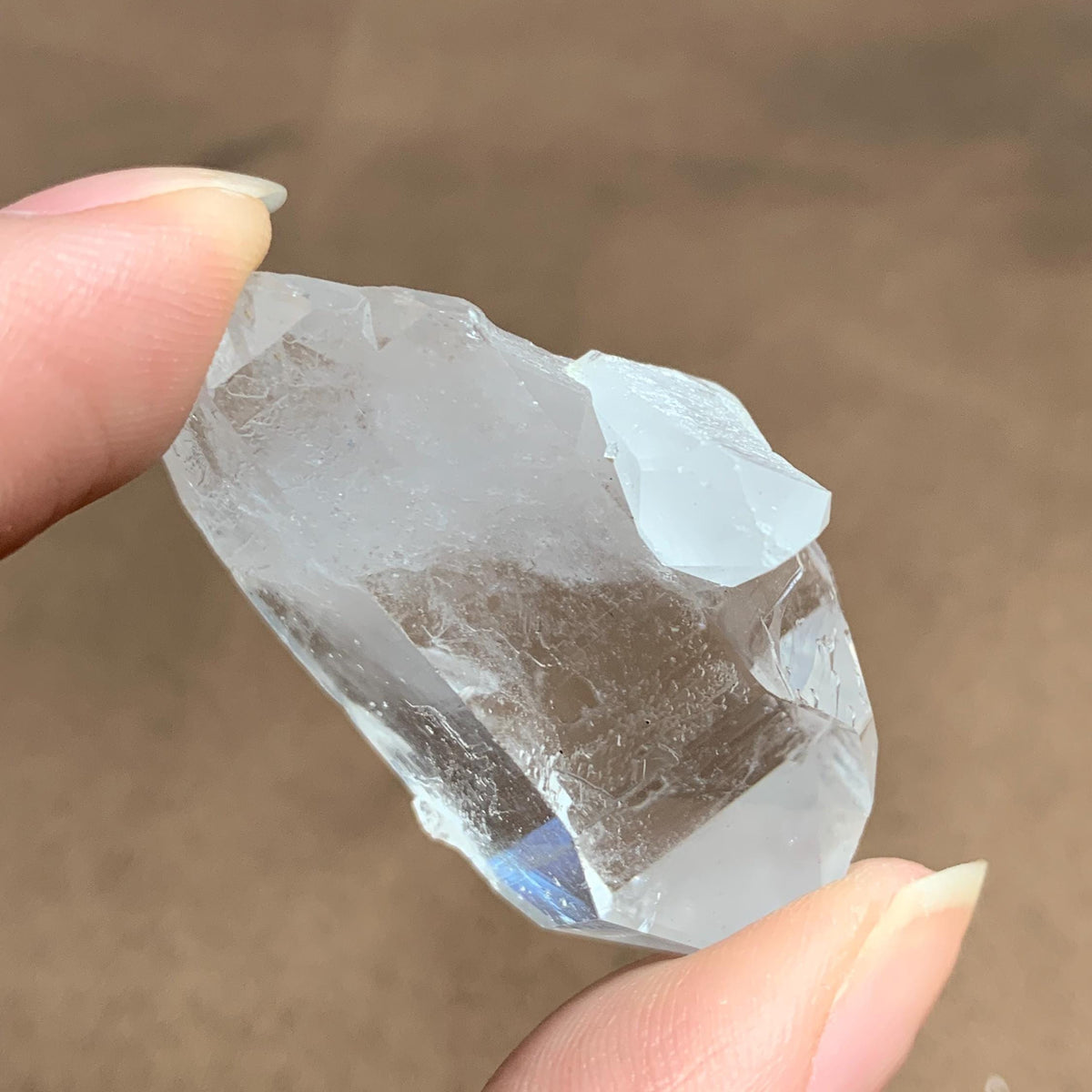 medium clarity quartz rider crystal point
