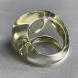 Artistic sculptural gemstone ring featuring clear yellow quartz