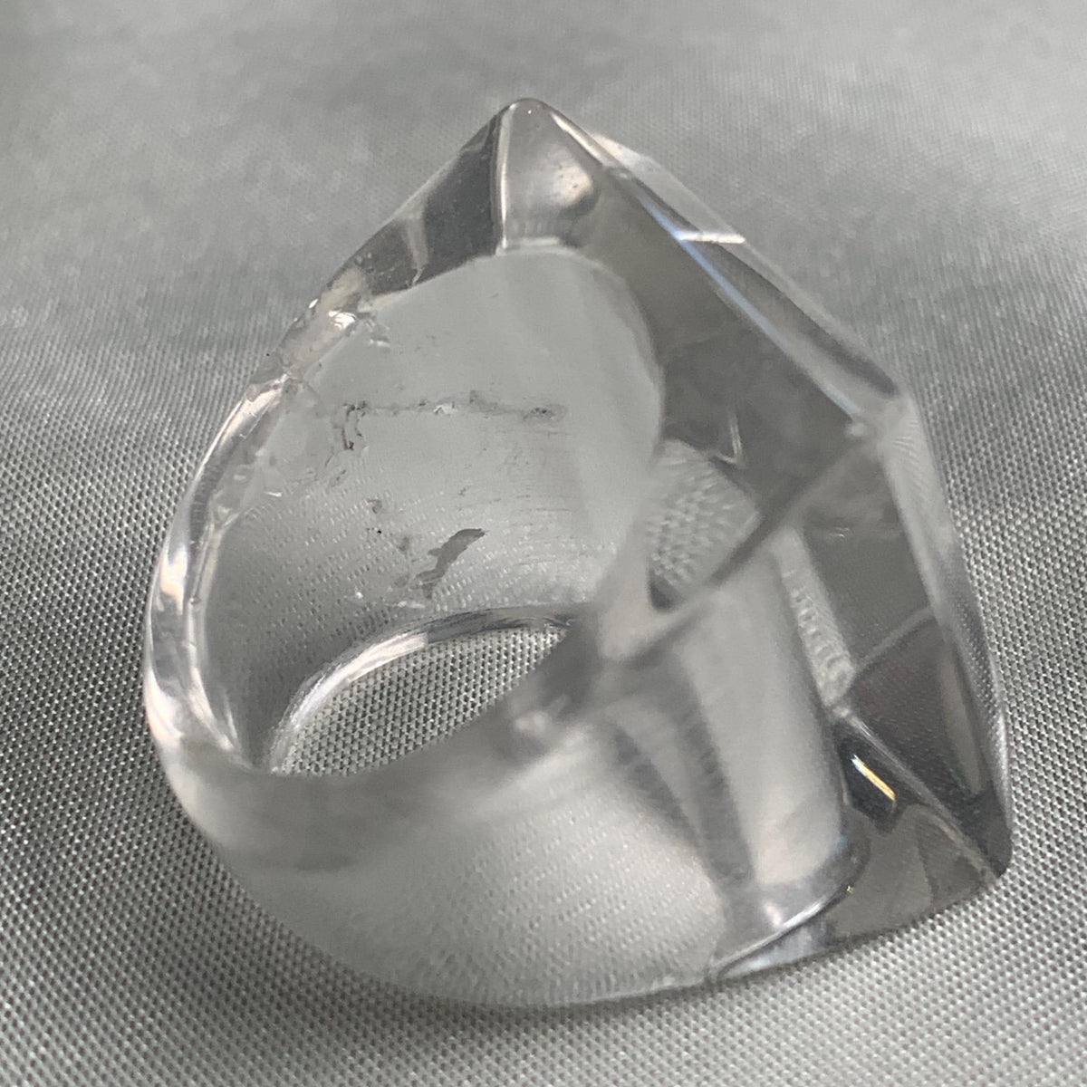Architectural crystal statement ring featuring geometric pyramid shape