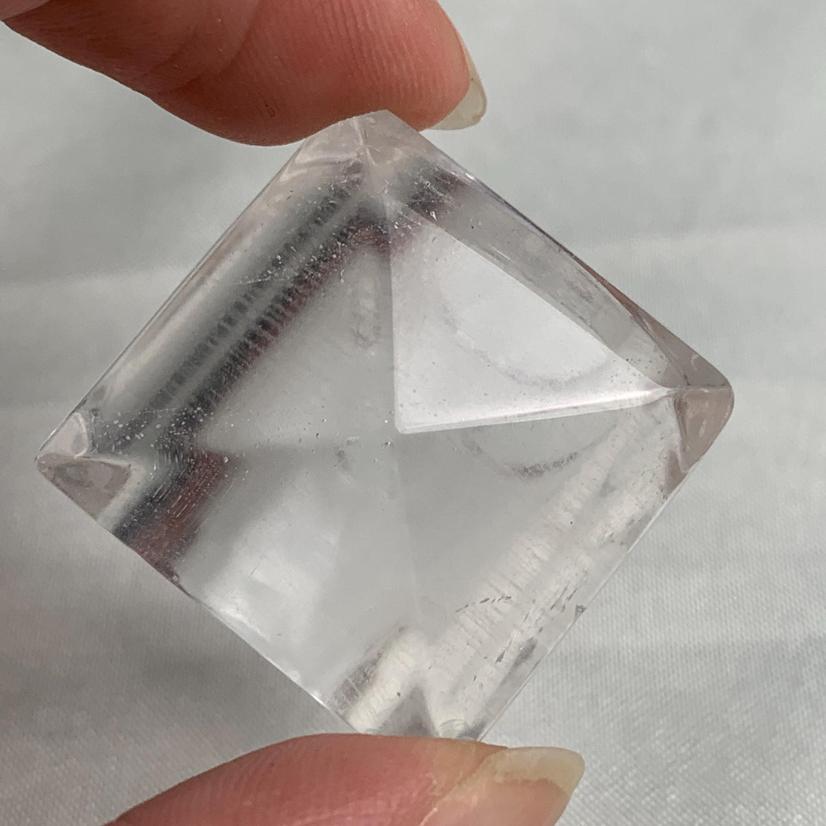 Contemporary sculptural gemstone ring made from natural clear quartz