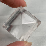 Contemporary sculptural gemstone ring made from natural clear quartz