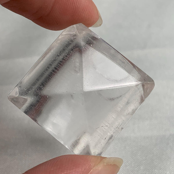 Contemporary sculptural gemstone ring made from natural clear quartz