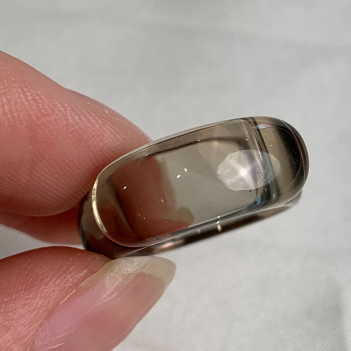 Handmade smoky quartz ring featuring a wide rectangular design
