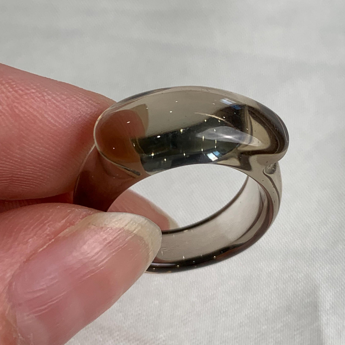 Architectural gemstone ring carved from a single piece of quartz