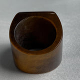 Sculptural tiger eye ring featuring a wide architectural band