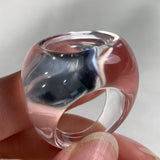 Wide band clear quartz ring with polished transparent finish