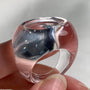 Wide band clear quartz ring with polished transparent finish