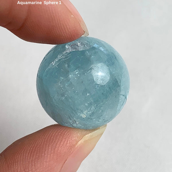 Deep blue aquamarine sphere 20mm displaying rich ocean color