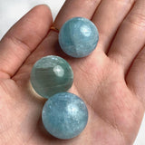 Deep blue aquamarine sphere 20mm displaying rich ocean color