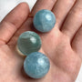 Deep blue aquamarine sphere 20mm displaying rich ocean color