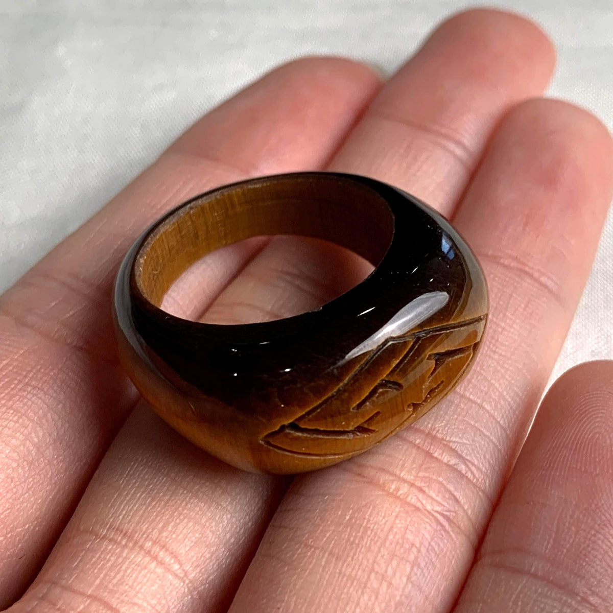 Chunky tiger eye cocktail ring with golden brown chatoyancy