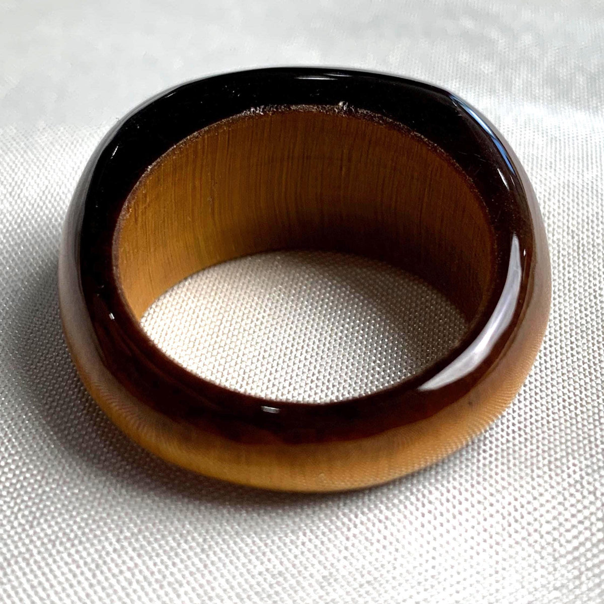Hand carved tiger eye ring made from a single piece of stone