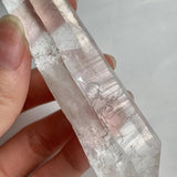 Side view of long double terminated Lemurian seed  crystal Quartz