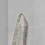 Close up of Isis face formation on a high clarity Lemurian quartz crystal