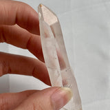 Clear quartz collector specimen measuring 91mm in length
