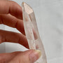 Clear quartz collector specimen measuring 91mm in length